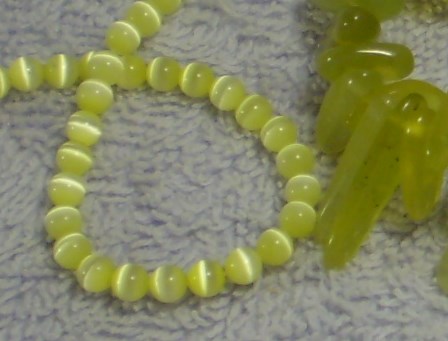 Fiber optic* and olive jade, close up. *Also known
